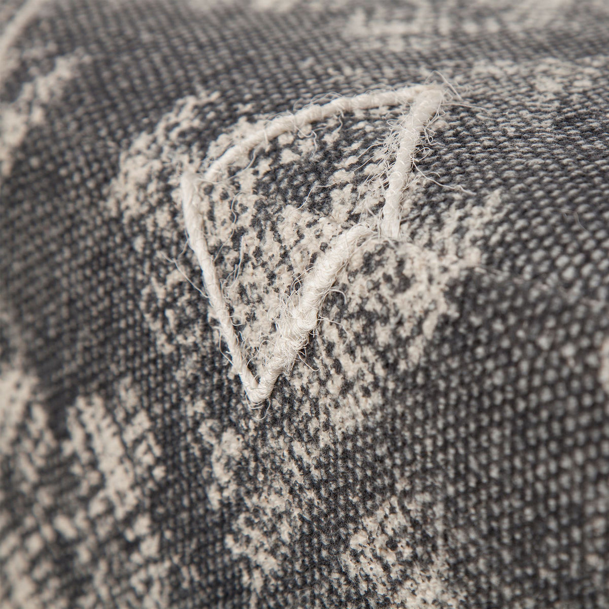 Pallu dhurrie ottoman, angle view