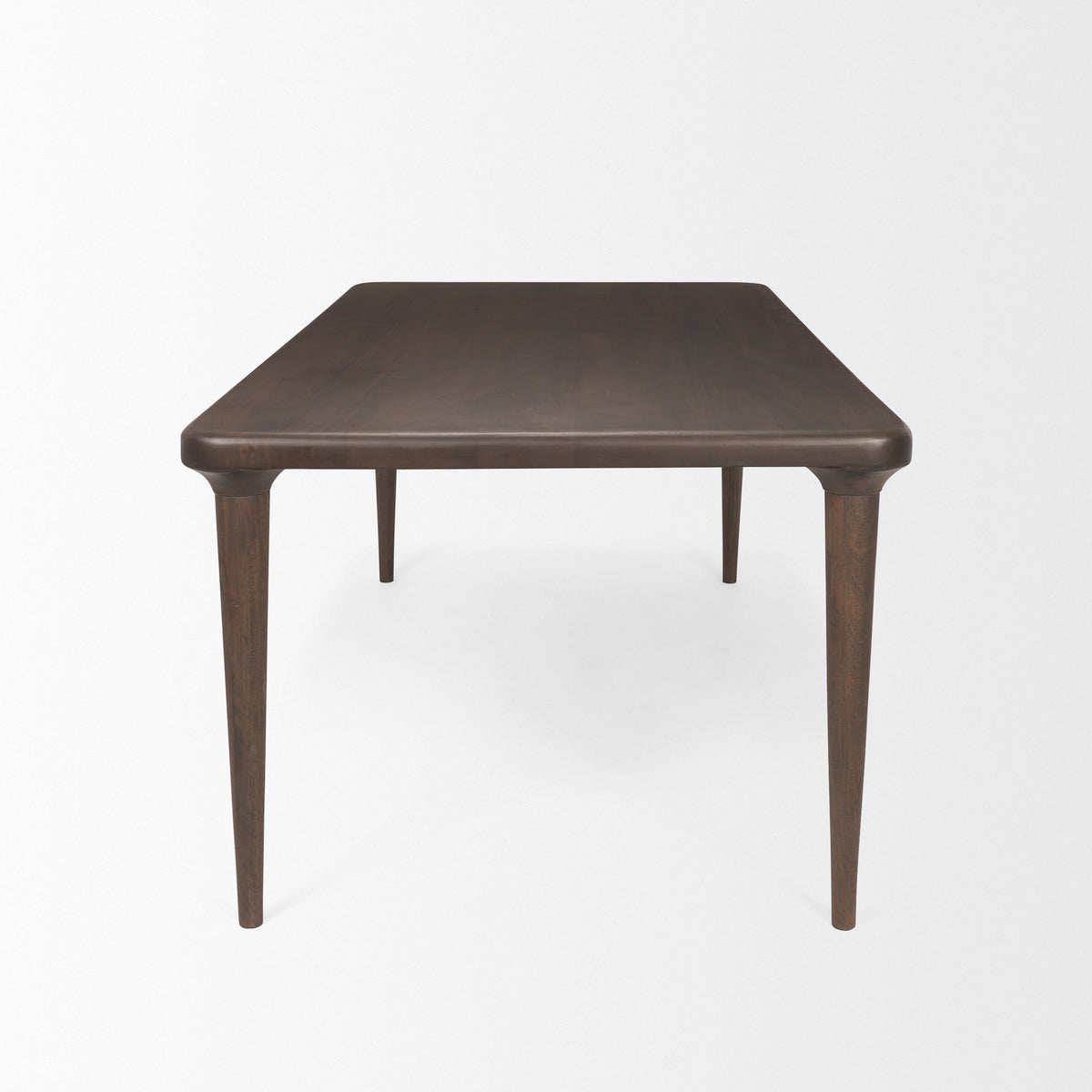 Suvan dining table in med-dark brown, side view