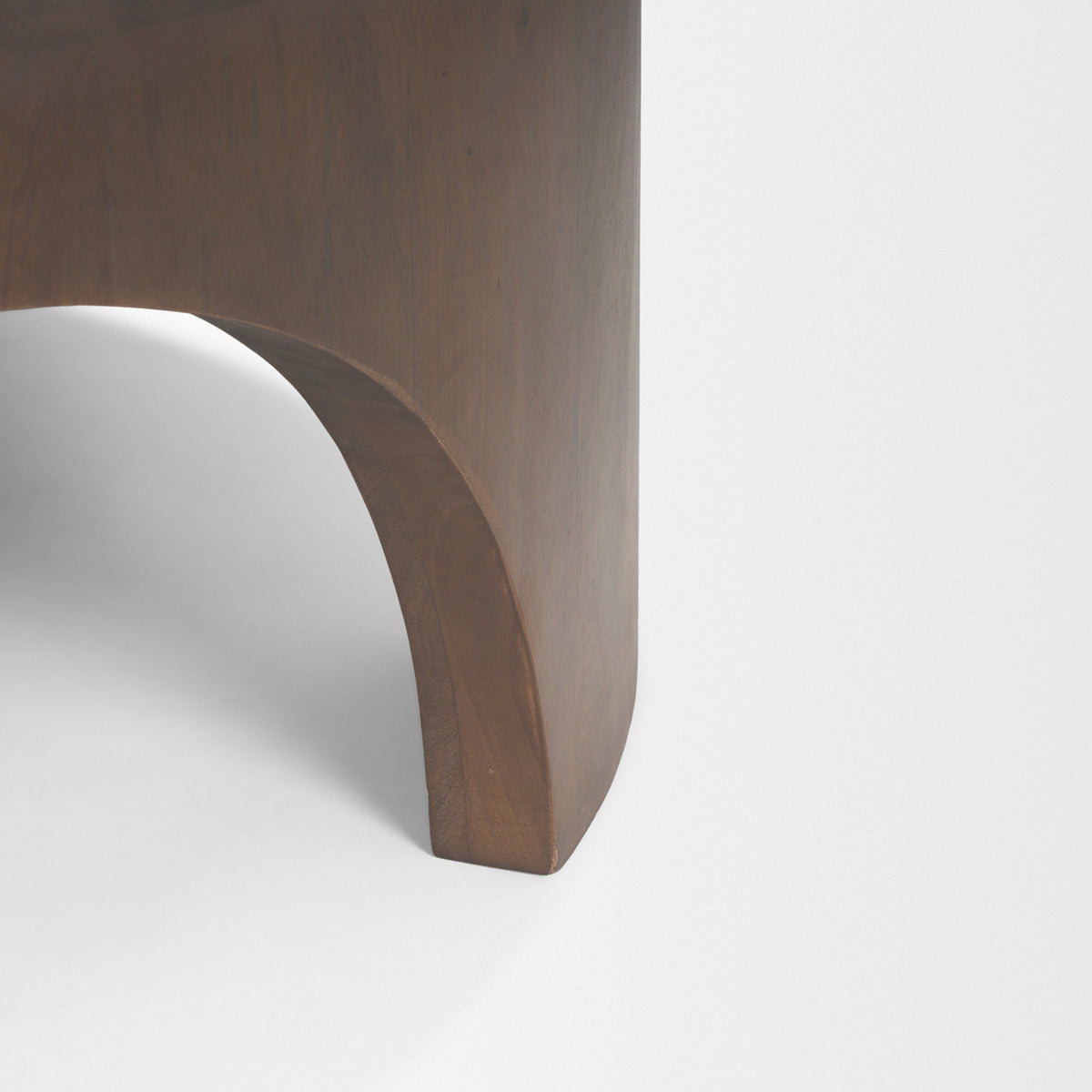 Shima dark brown arched leg close-up