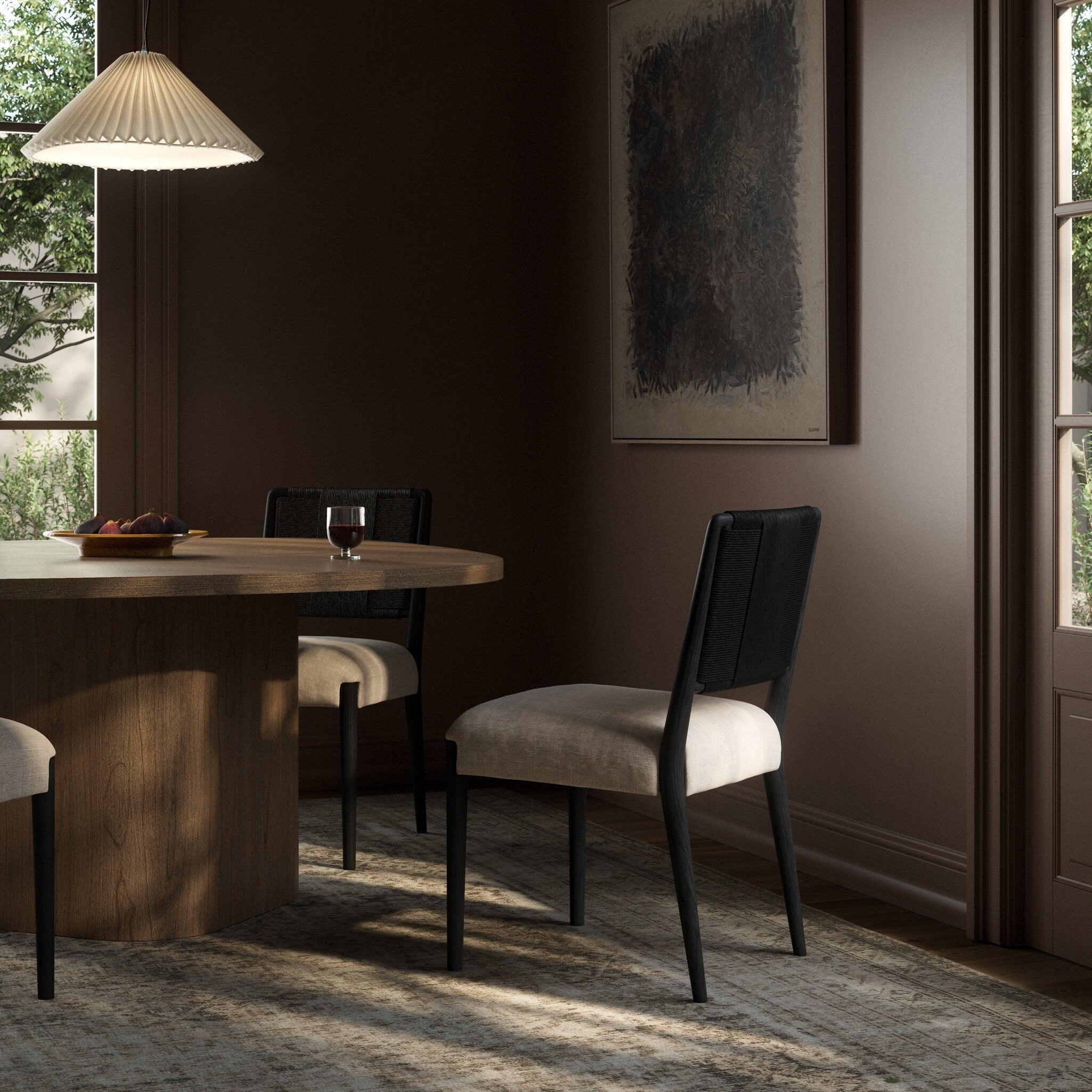 Rothler Dining Chair in Black Brushed Ash and Essence Natural styled in a dining room