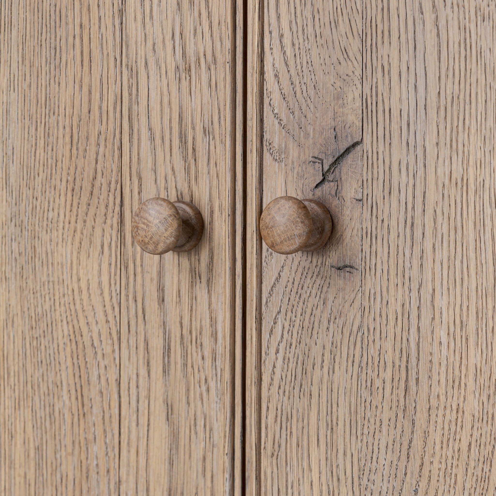 Pika Armoire detail, weathered oak grain and tonal brown finish
