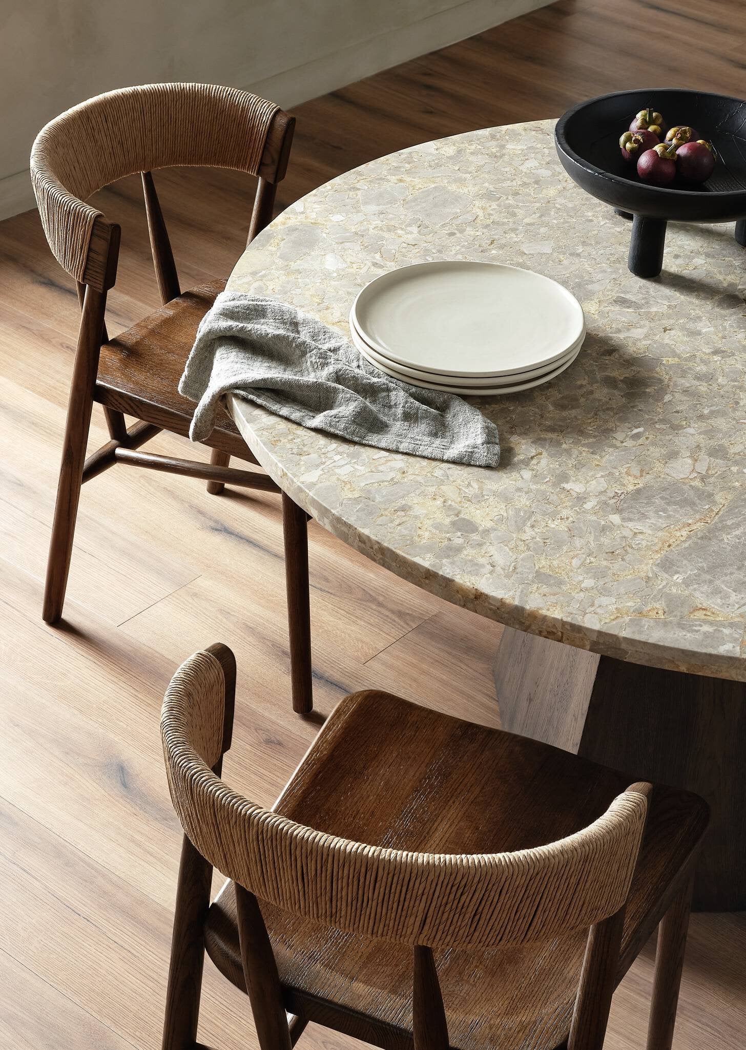Brisa Round Dining Table 55" — styled dining scene