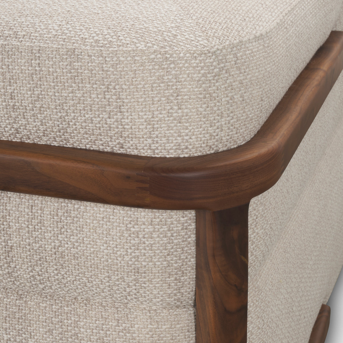 Warner sofa walnut wood arm and Oatmeal fabric close-up