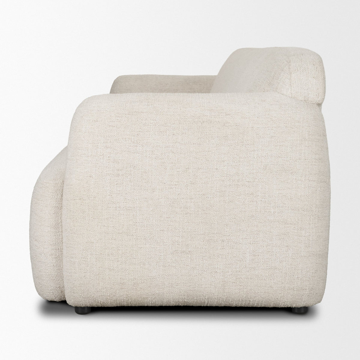 Saga sofa cream, side view