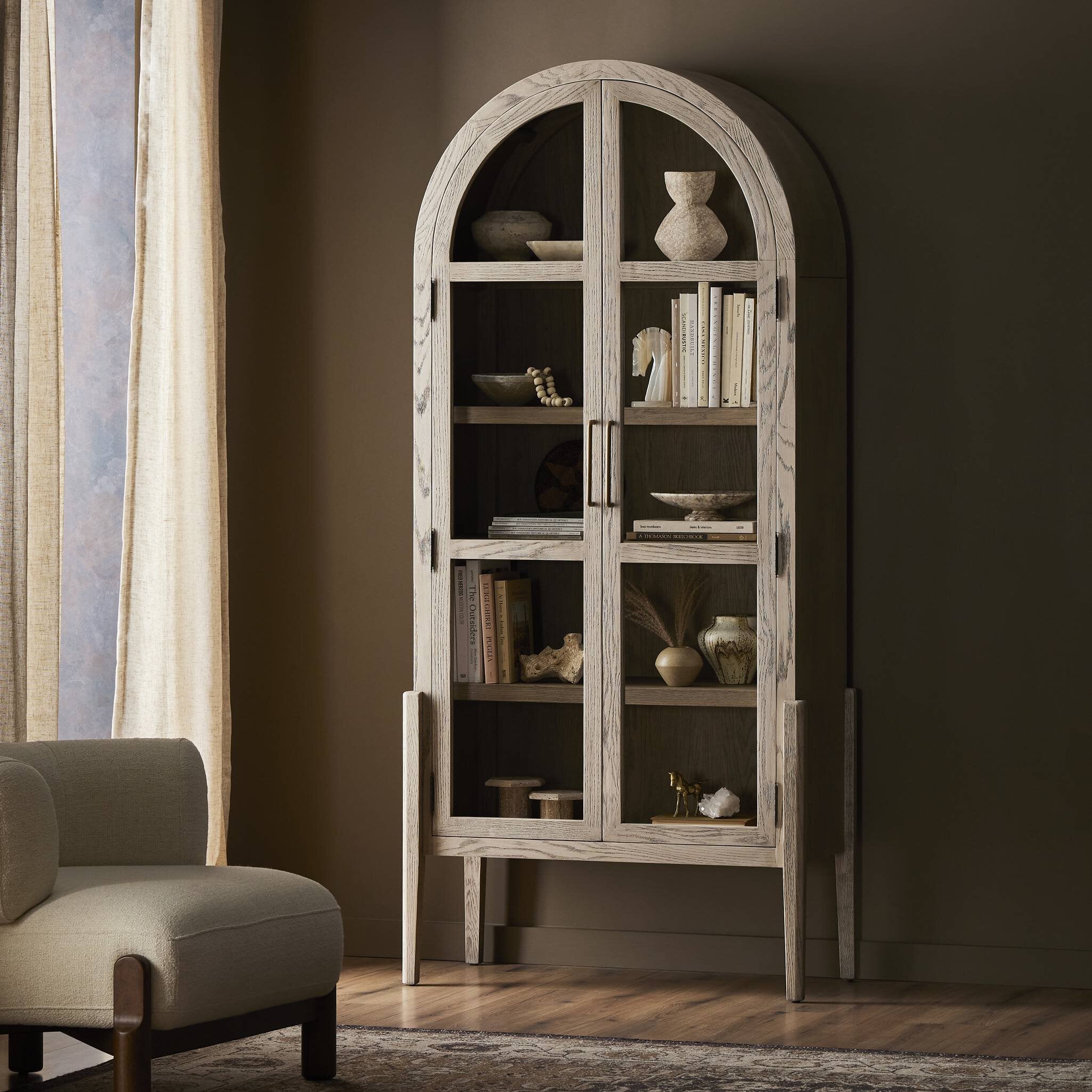 Tolle Cabinet in Warm Natural Oak — styled in a living space