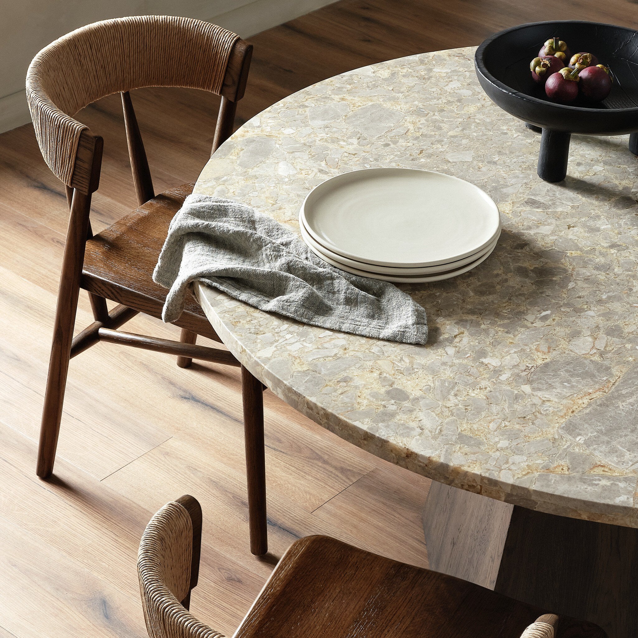 Brisa Round Dining Table 55" — styled in a dining space
