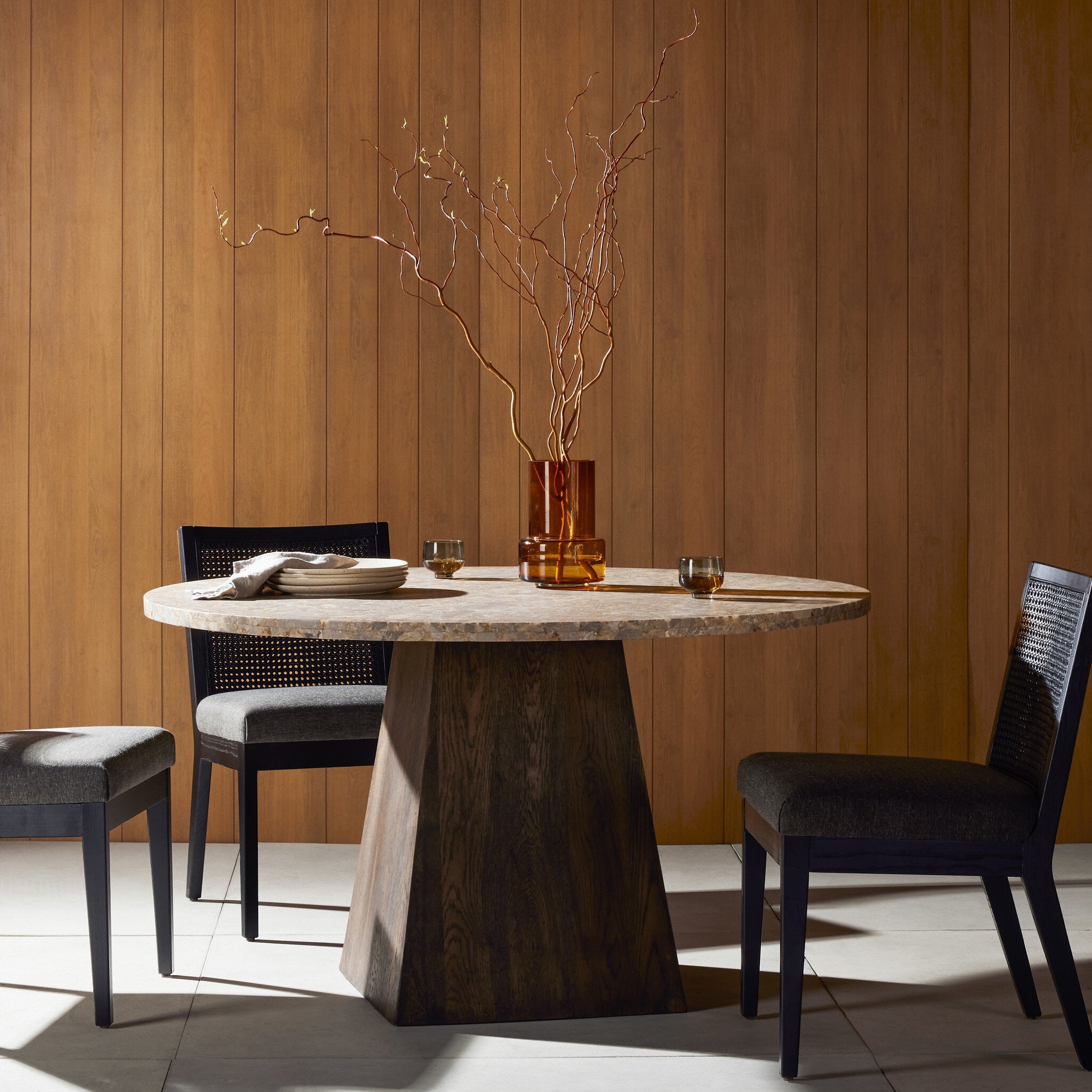 Brisa Round Dining Table 55" — lifestyle view in a dining room