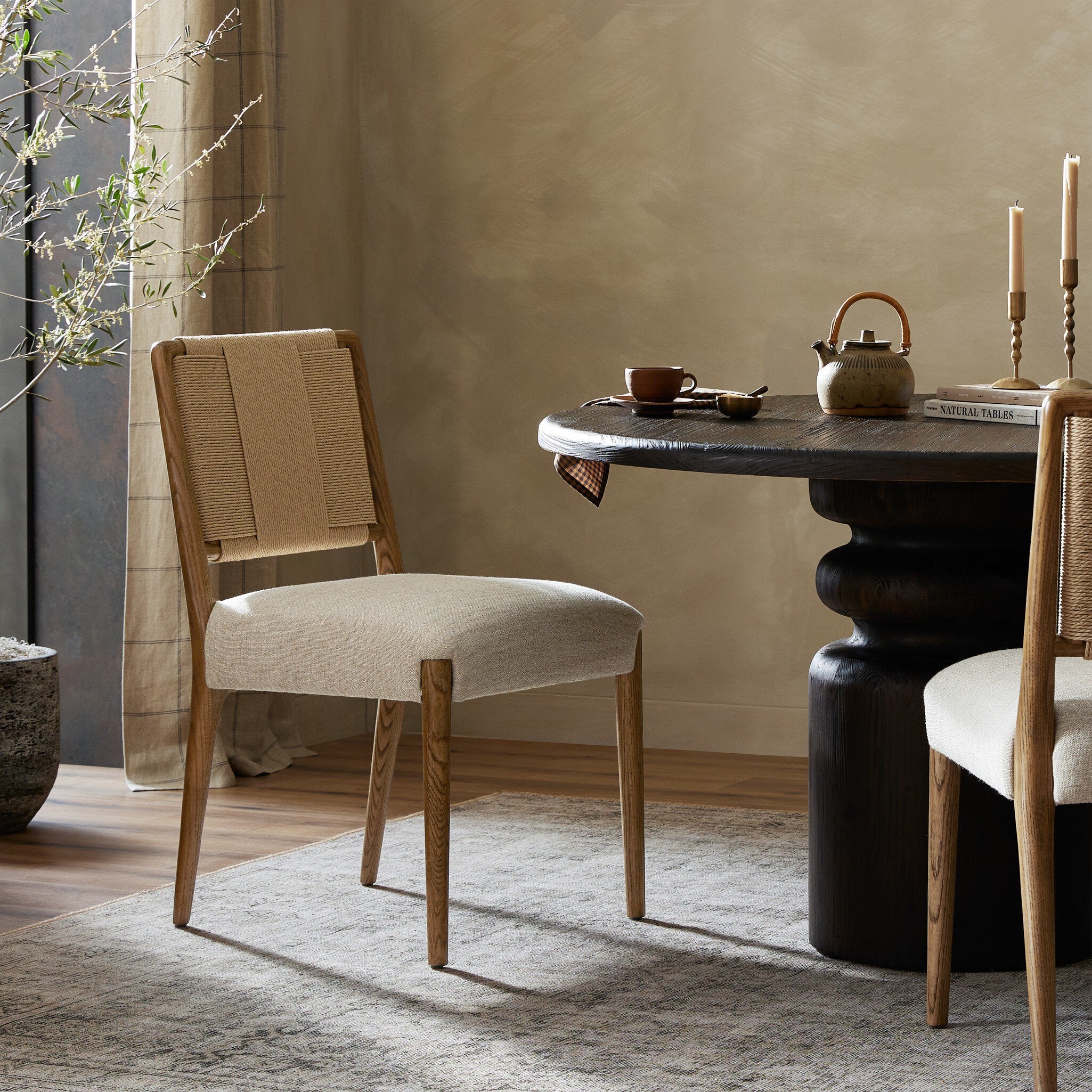 Rothler Dining Chair in Tan Ash and Alcala Wheat styled in a dining room