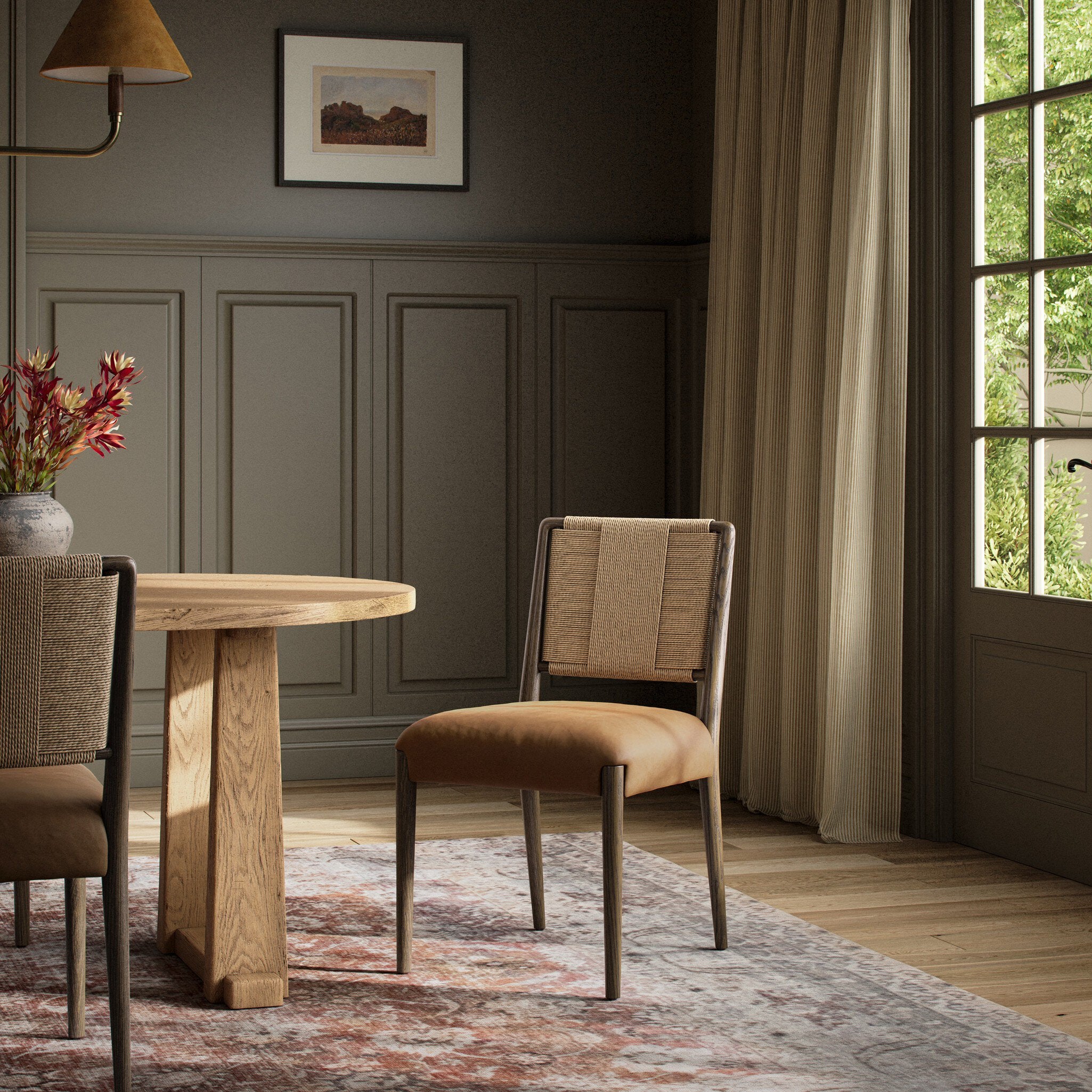 Rothler Dining Chair in Tan Ash and Maestro Camel leather styled in a dining room