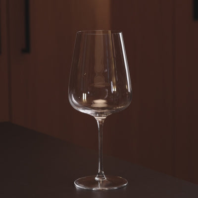 Red wine poured into crystal Cabernet wine glass, Fable wine glasses set of 4