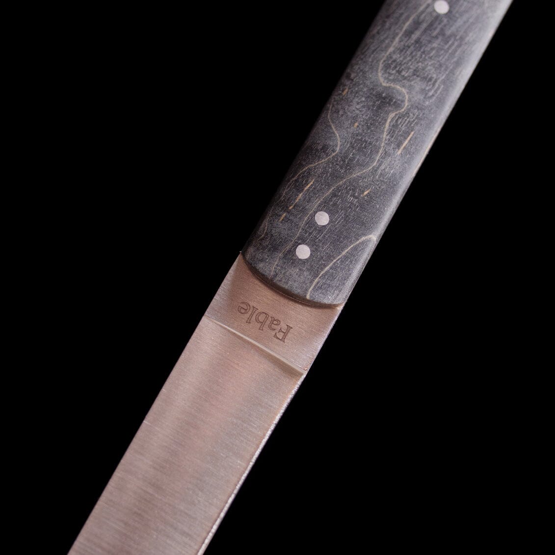 Fable steak knife blade detail with branded handle